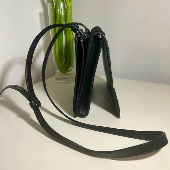 Alexander Wang
Ponyhair-Trimmed Leather Crossbody Bag - Picture 4 of 9